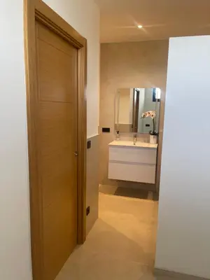 a shower stall in a bathroom with a toilet at Luxury sea view apartment near Sitges in Olivella
