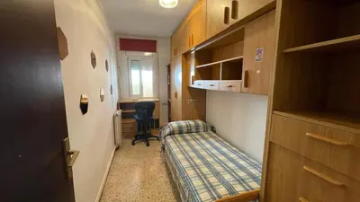 a small room with a bed and a desk at Maresme in Canet de Mar