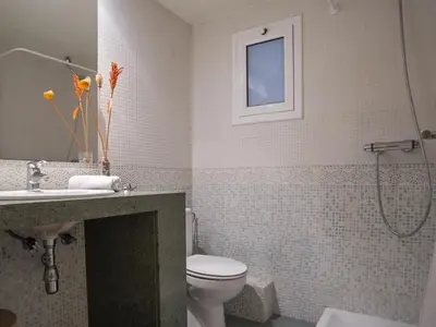 a bathroom with a toilet and a sink and a shower at Apartamento en el centro de Barcelona! in Barcelona