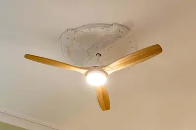 a ceiling fan with a light on a ceiling at BOLIVIA. NEWLY RENOVATED FULL APARTMENT WITH BRIGHT TERRACE in Barcelona