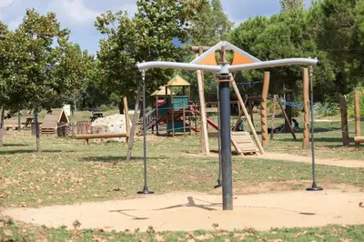 a playground in a park with a play structure at TARRACO - Private Pool Villa in Arenys de Munt in Arenys de Munt
