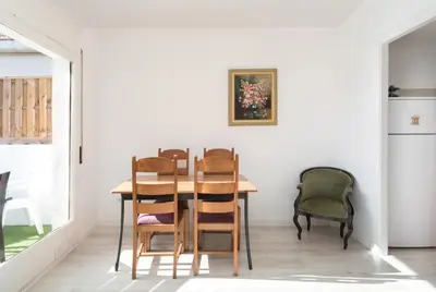 a dining room with a table and chairs at Apartamento 2º centrico con Parking en Calella,Barcelona in Calella