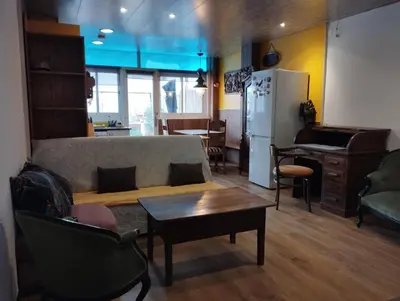 a living room with a couch and a table at Apart 1º & Spa and Parking in Calella, Barcelona in Calella