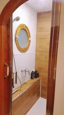 a bathroom with a sink and a mirror at Apart 1º & Spa and Parking in Calella, Barcelona in Calella