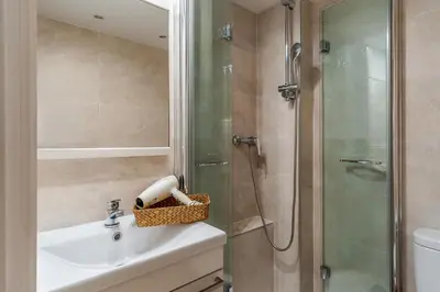 a bathroom with a shower and a sink and a toilet at 2537 - AB Sant Antoni Studio in Barcelona