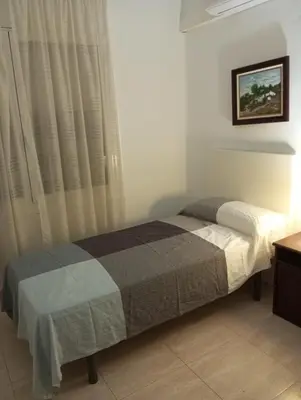 a bedroom with a bed in a room at Un lugar tranquilo y relajado in La Salud