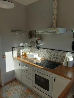 a white bathroom with a sink and a mirror at CORRAL DEL BLANCH, La Tolla del Blanch in Torrellas de Foix