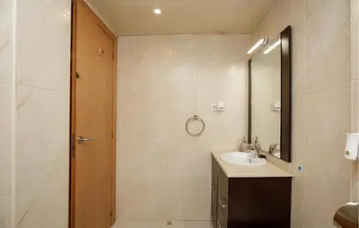 a bathroom with a sink and a mirror at Beautiful Apartment In Pineda De Mar in Pineda de Mar