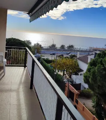 a balcony with a view of the ocean at Apartment Llavaneres II in Sant Andreu de Llavaneres