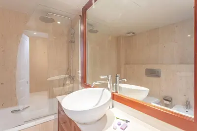 a bathroom with a toilet and a sink and a shower at My Space Barcelona Penthouse Terrace in Barcelona