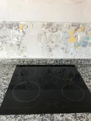 a stove top oven sitting on top of a counter at Apartments San Ignacio de Loyola in Manresa