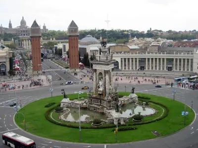 a large fountain in the middle of a city at Hostal Baler in Barcelona
