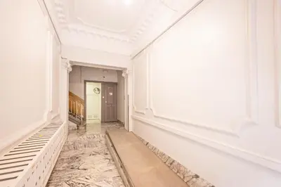an empty hallway with white walls and a white ceiling at Sweett - Rosemarine in Barcelona