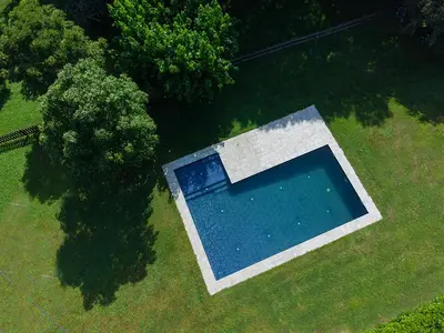 an overhead view of a swimming pool in a yard at Can Marc in Sant Esteve de Palautordera