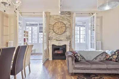 a living room with a couch and a fireplace at Apartment Lucia in Barcelona