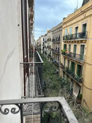 a view from the balcony of a building at Central and Basic Universitat for YOUNG HOSTEL in Barcelona