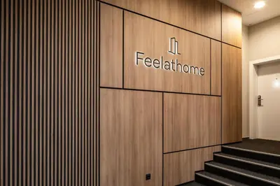 a wall with a fedex machine sign on it at Feelathome Poblenou Beach Apartments in Barcelona