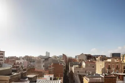 an aerial view of a city with buildings at Feelathome Poblenou Beach Apartments in Barcelona