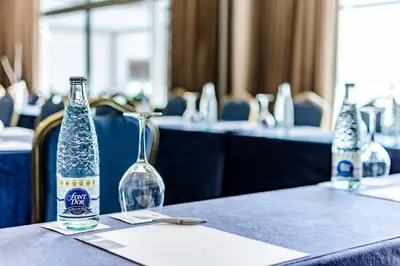 two bottles sitting on a table in a room at Eurostars Executive in Barbera del Valles