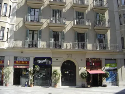 a large building with balconies on the side of it at Ally's Bed&Breakfast, in Barcelona