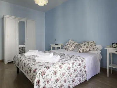 a bedroom with a bed with towels on it at Apartment in Barcelona near Passeig de Gràcia in Barcelona