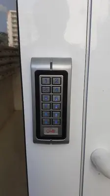 a refrigerator with a remote control attached to it at Apartaments Mar Blau Calella in Calella