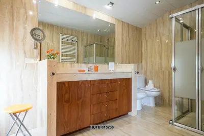 a bathroom with a sink and a toilet at Alcam Can Macia in Corbera de Llobregat