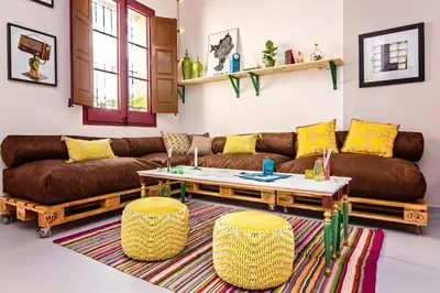 a living room with a couch and a table at Sweett - Raco in Barcelona