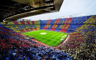 a crowd of people in a stadium watching a soccer game at Casa Natura Barcelona Fira & Camp Nou Stadium in Hospitalet de Llobregat