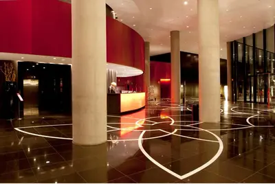 a lobby with a heart painted on the floor at Hotel Porta Fira 4* Sup in Hospitalet de Llobregat