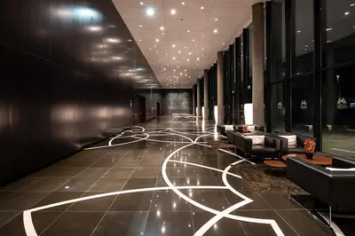 a lobby with couches and chairs in a building at Hotel Porta Fira 4* Sup in Hospitalet de Llobregat