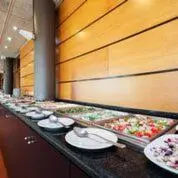 a buffet line with many plates of food at Hotel Granollers in Granollers