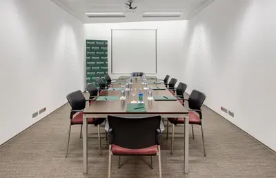 a large conference room with a long table and chairs at Sercotel Hotel Rosellon in Barcelona