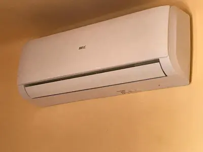 a white air conditioner on a wall at Hostal Bonavista in Calella