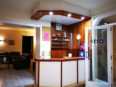 a bar in a living room with a couch at Hostal Bonavista in Calella