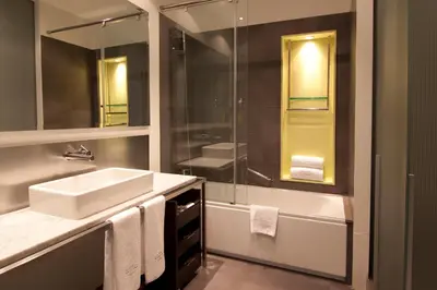 a bathroom with a sink and a shower at Sixtytwo Hotel in Barcelona