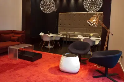 a living room with a couch and chairs and a table at Sixtytwo Hotel in Barcelona