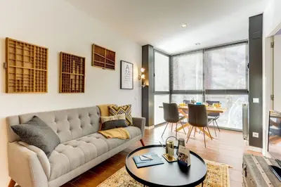 a living room with a couch and a table at Sweett - Raul in Barcelona
