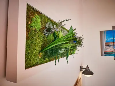 a painting hanging on a wall in a room at Vila De Premiá in Premiá de Mar