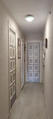 an empty room with a door and a hallway at Apartment Oliver in Calella