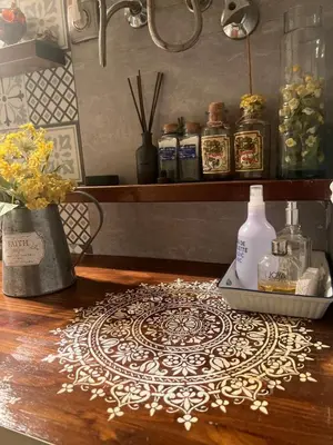 a table topped with a lace rug on a wooden table at Apartment Oliver in Calella