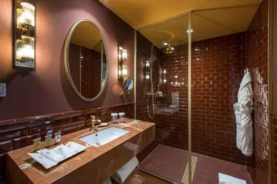 a bathroom with a sink and a shower at Vincci Mae in Barcelona