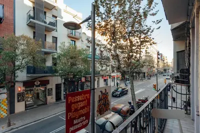 a view of a city street from a balcony at Design Apartments by Olala Homes in Hospitalet de Llobregat