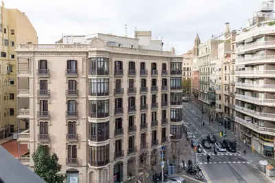 a large building on a street in a city at Sibs Bcn- Balmes- Romantic CityCentre Beautiful in Barcelona
