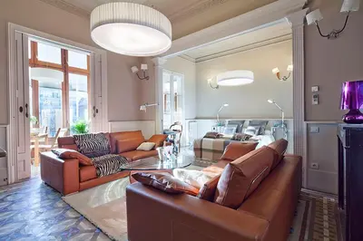 a living room with a couch and a table at Apartment Barcelona Rentals - Rambla de Catalunya Center in Barcelona