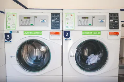 two washing machines sitting next to each other at HolaCamp Sitges Relax in Sitges