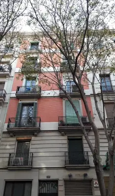 a tall building with balconies on the side of it at ApartEasy - Family Sant Antoni apt. in Barcelona