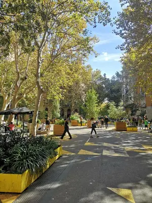 a group of people walking in a park at ApartEasy - Family Sant Antoni apt. in Barcelona