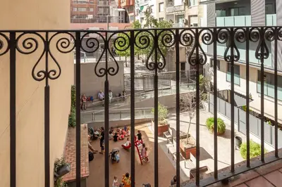 an overhead view of a city street from a balcony at Sagrada Familia V in Barcelona