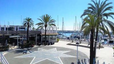 a star on the ground in front of a marina at Marina Port & Beach-Apartment in Masnou